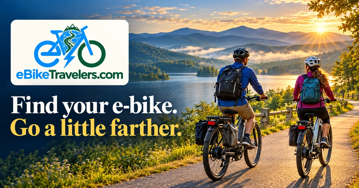 Two helmeted e-bike travelers beside a mountain lake at sunrise, with the eBikeTravelers.com logo and “Go a little farther” headline.